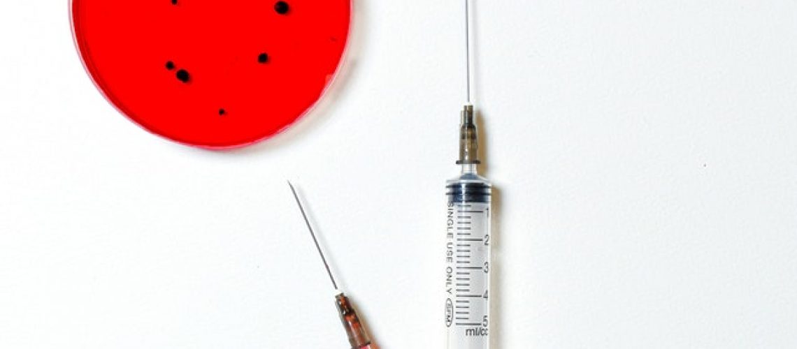 syringes-and-petri-dish-on-white-background-3786122.jpg